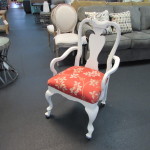 UPHOLSTERED ROLLING ARM CHAIR