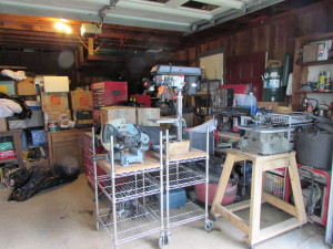 GARAGE FULL OF TOOLS AND BOXES